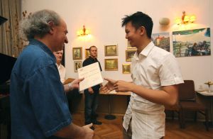 Fryderyk Hoang Dong receives diploma; Music and Literature Club 30. Aug 2012.